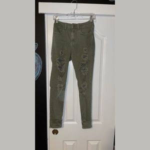 Army green ripped skinny jeans